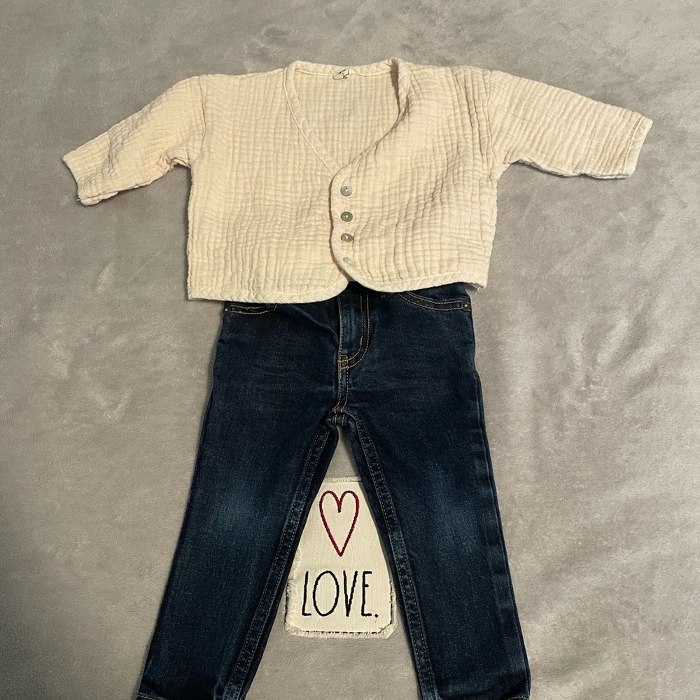 OshKosh B'gosh Blue Jeans and cream textured jacket.